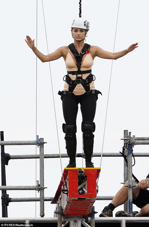 Scary: The Sun has obtained footage of the crew attempting the Walk The Plank challenge atop the Focus Building in Surfer's Paradise (Ola Jordan pictured during the challenge in 2016)