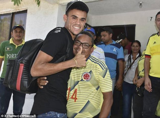 Luis Manuel Diaz pictured with his son Luis Diaz, who plays for Liverpool and Colombia