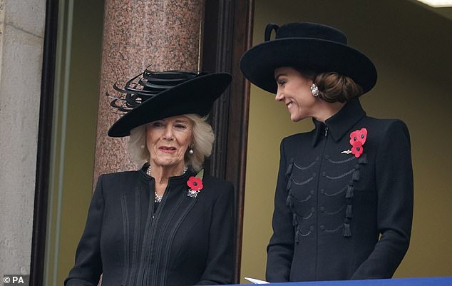 Kate, 41, paid her respects in a black ensemble with a red metal poppy on her chest