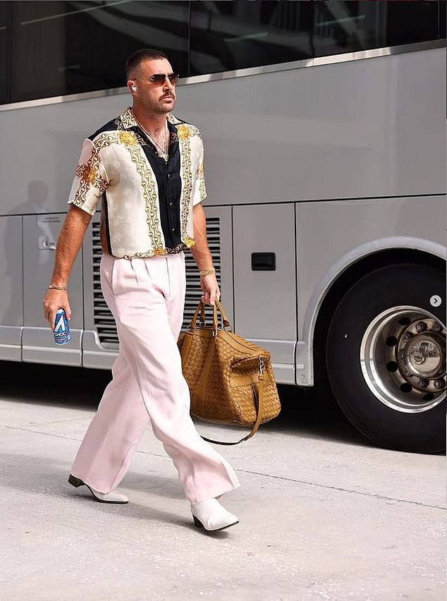 Celebrities are commenting on Kelce's outfit on Instagram.  “That sh** fly Trav,” says rapper Snoop Dogg