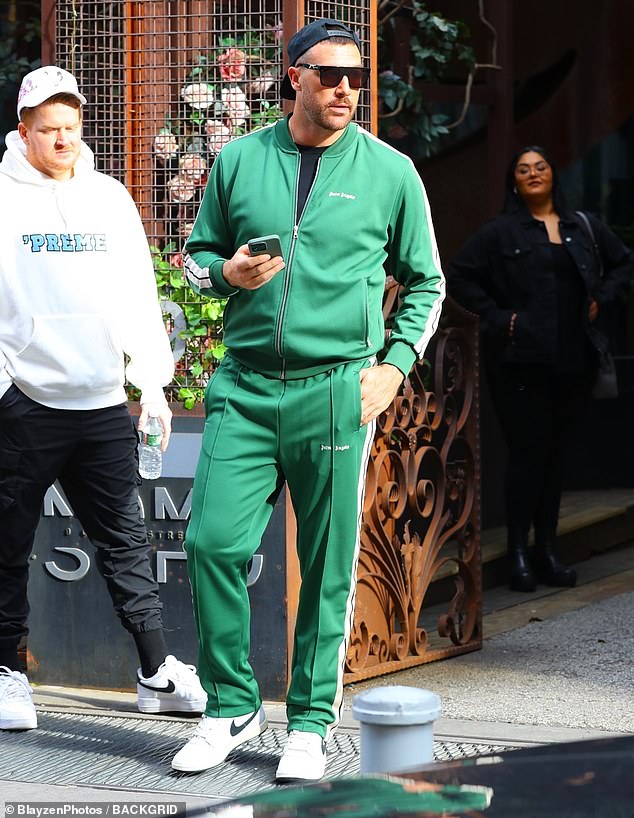 Kelce was spotted in an all-green tracksuit after leaving Swift's home in New York City