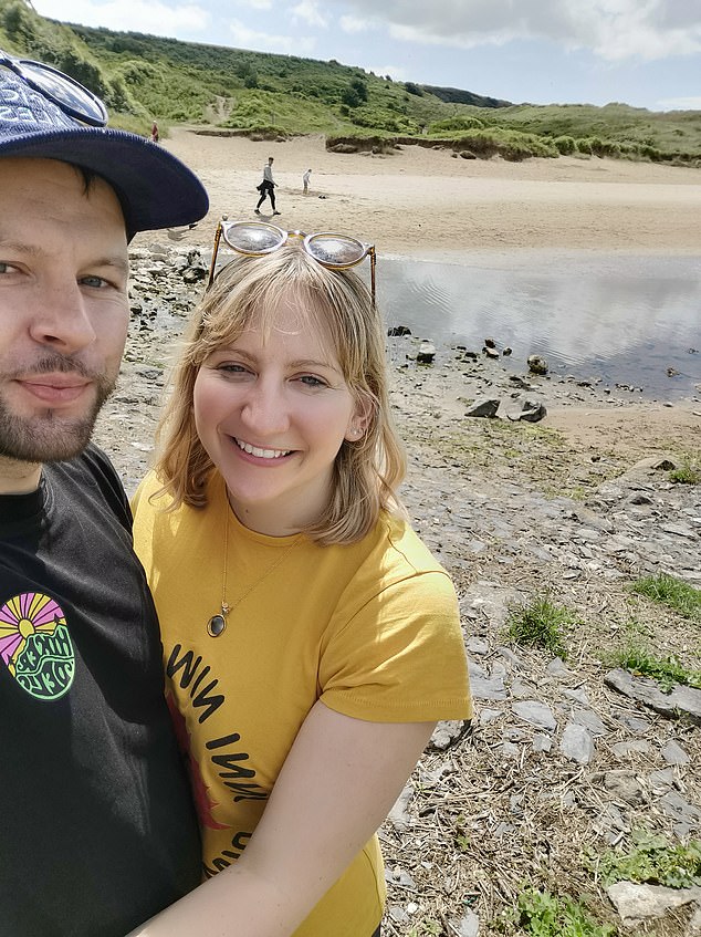 Mr Collins pictured with his girlfriend, Claire Hawk, who encouraged him to return to the doctors after the headaches returned