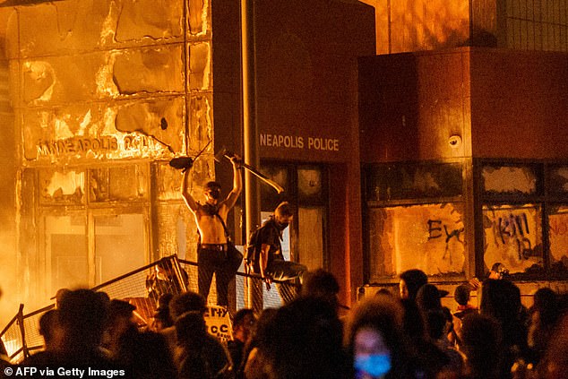 By comparing the abortion issue to “defunding the police,” Coulter seems to suggest that this could be the downfall of the Republican Party among the electorate.  Pictured: Flames illuminate demonstrators standing near the Third Precinct during protests against the killing of George Floyd in Minneapolis on May 28