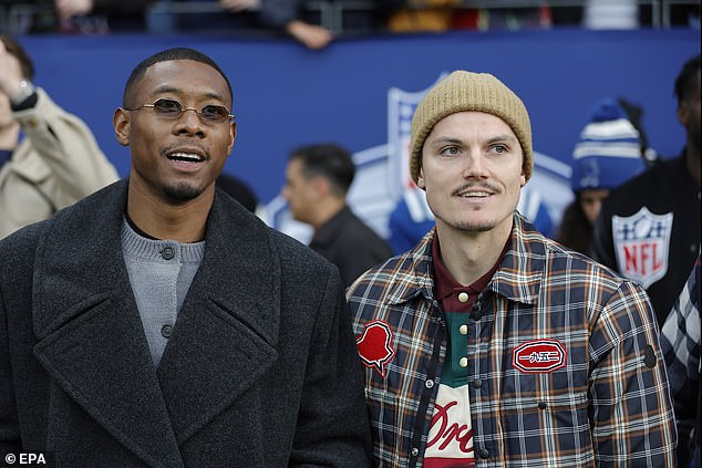 Bayern Munich's David Alaba (left) and Borssuia Dortmund's Marcel Sabitzer looked on