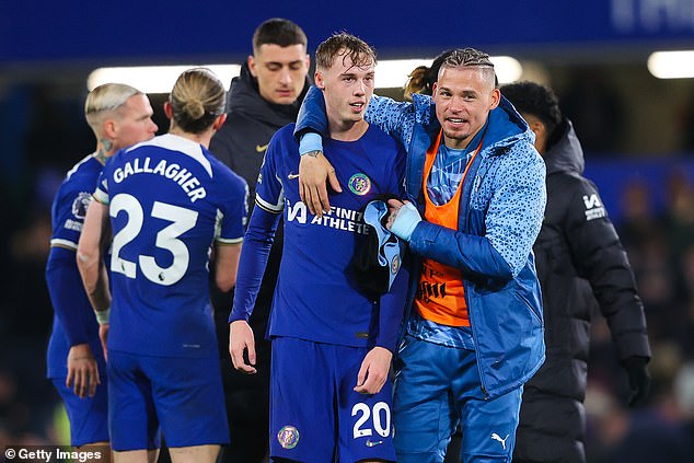 Palmer enjoyed some time with City midfielder Kalvin Phillips (right) after the match.