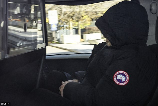 Peter Nygard leaves court in a police van after being found guilty of four charges of sexual assault, in Toronto, on Sunday, November 12, 2023