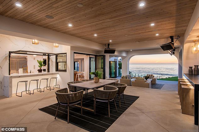 Outside, an updated grill and expansive covered patio make entertaining guests easy