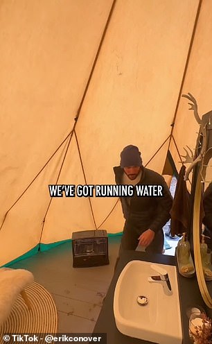 Erik moves into a separate 'bathroom tent' and shows how there is running water, a sink, 'even a flushable toilet' and a shower with hot water