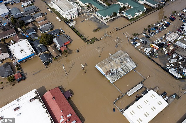 Parts of downtown Pajaro were flooded after a levee on the Pajaro River in Monterey County broke following another storm on Friday.  The latest storm has forced nearly 27,000 people to be evacuated due to the risk of flooding and landslides, and 16 major rivers in the state have burst their banks.