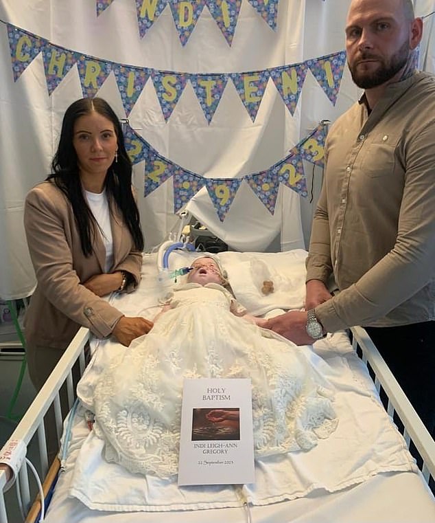 Indi pictured at her baptism with her parents Claire Staniforth and Dean Gregory