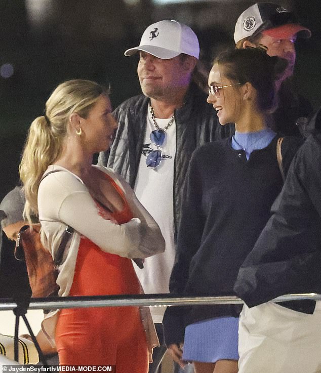 Vince wore a white T-shirt and blue jeans as he arrived at the dock with his longtime girlfriend Rain Hannah