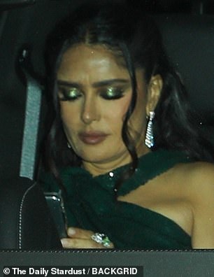 Beauty: Salma Hayek, 57, was completely glamorous as she left the birthday extravaganza with glitter makeup to match her green dress