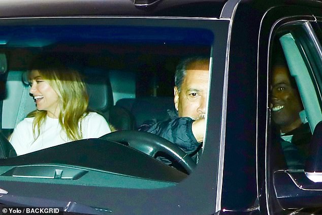 Surprise couple: Olivia Wilde, 39, who split from Harry Styles, 29, last year, was spotted leaving the party with fellow single Chris Rock, 58