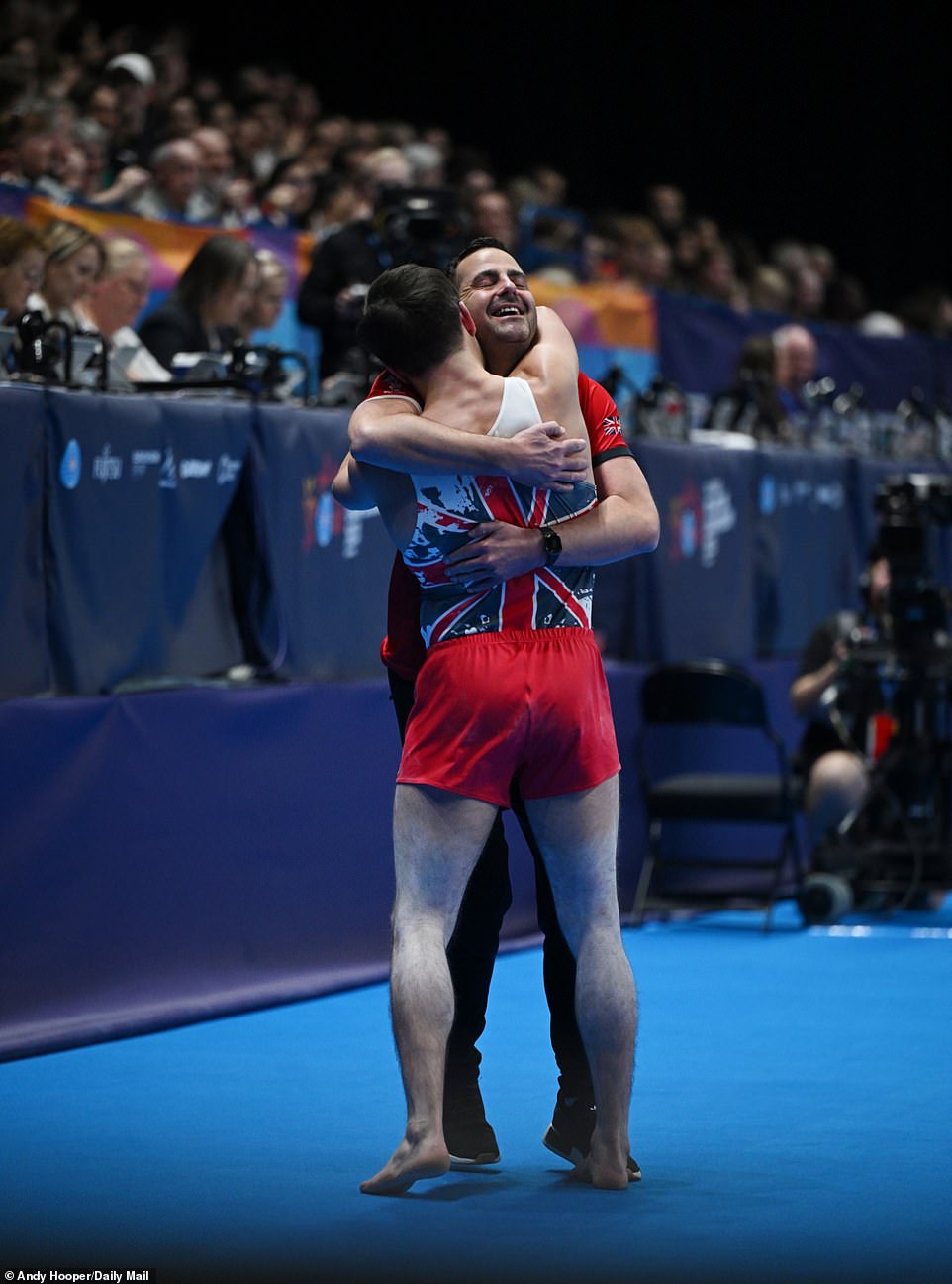 Two athletes are overjoyed after claiming silver to support Team GB's medal win as they embrace in an emotional moment