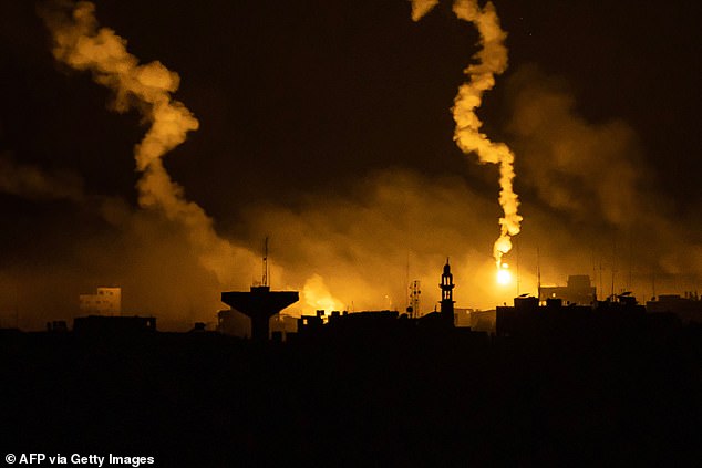 Flares are dropped by Israeli forces over the Palestinian enclave – near Sderot along Israel's border with the Gaza Strip – early November 13, 2023