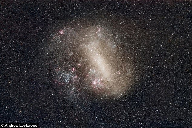 The Large Magellanic Cloud (pictured) is 160,000 light-years away, while the Small Magellanic Cloud is about 200,000 light-years away