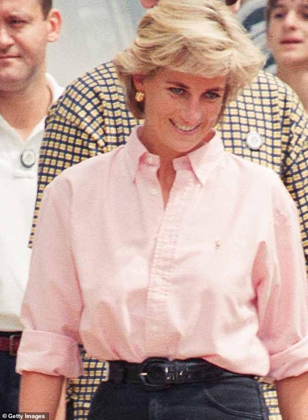 Diana is captured in Bosnia in August 1997, a trip made as part of her work to raise awareness about landmines.  She wears a light pink shirt and large gold earrings