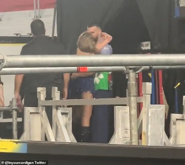 The couple was seen kissing at the side of the stage as Kelce greeted Swift when she finished