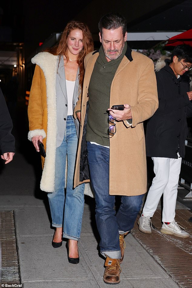 Autumn fashion: Anna wore a sheepskin coat, while her husband dressed in a neat jacket