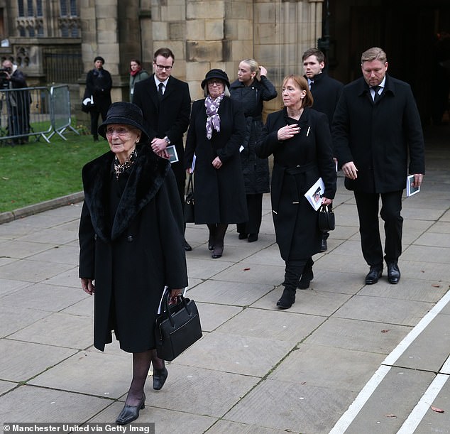 Lady Norma Charlton and family left Manchester Cathedral after the funeral service