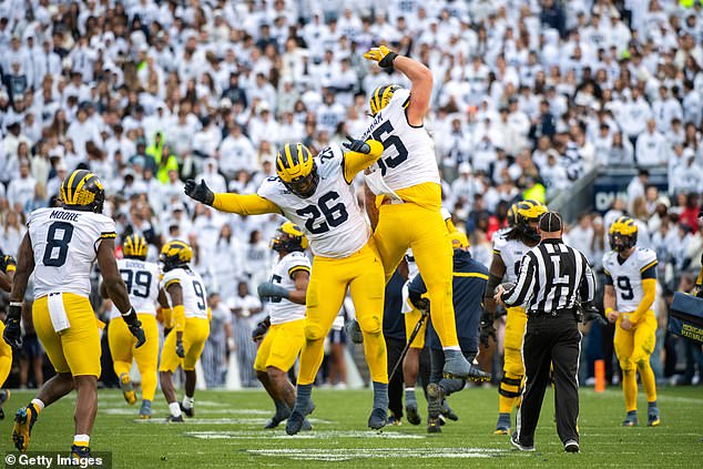 Without their coach on the sidelines, the Wolverines still managed to beat Penn State