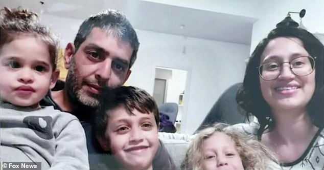 Killed and kidnapped: Abigail's father Roy Edan, 43, and his wife Smadar Edan, 40, were murdered by Hamas.  Their two oldest children, Michael and Amalia, hid in a closet and are still alive.  Abigal, their youngest (pictured far left) is currently being held hostage in Gaza