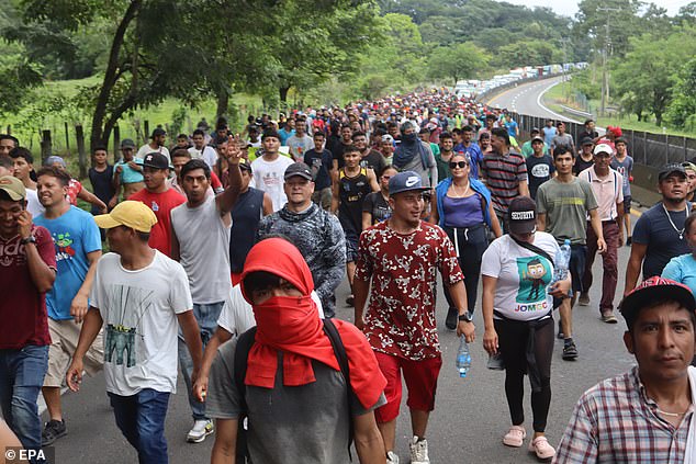 Hundreds of migrants march in a caravan in southern Mexico, many heading for the US