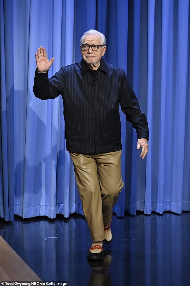 Interesting: The 77-year-old actor entertained fans as he walked on stage in a pinstripe shirt, camel leather pants and vibrant brogues