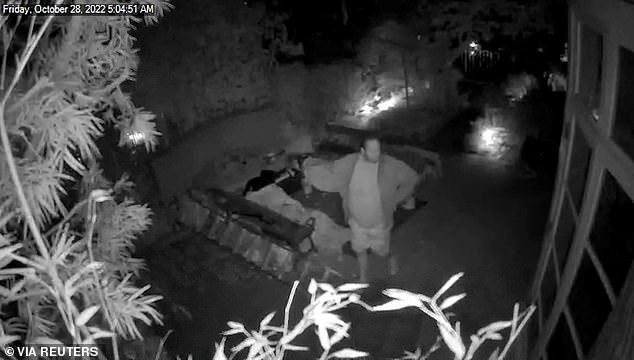 A screenshot of security footage shows DePape outside the Pelosi House during the early hours of October 28, 2022
