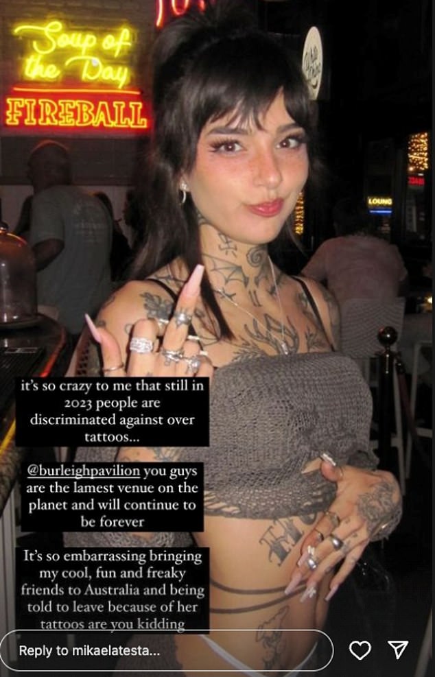 The 23-year-old woman said it was 'embarrassing' to bring her tattooed friend (pictured), who is new to the country, to the pub - only to be told they are not welcome