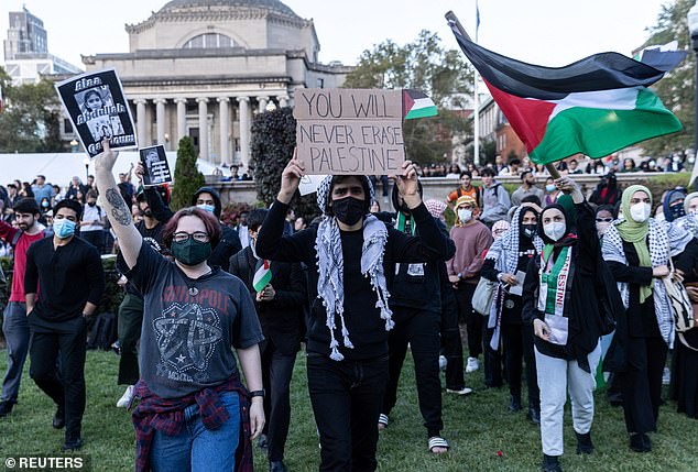 Palestinian students take part in a protest in support of Palestinians amid the ongoing conflict in Gaza, at Columbia University in New York City