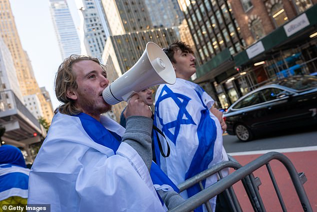 Counter-protesters supporting Israel shout at City University of New York (CUNY) students and other supporters of Palestine as they hold a rally in front of the chancellor's office in downtown Manhattan on November 2, 2023.