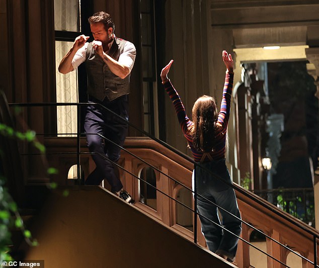 Action shot: Ryan and Cailey were spotted posing on the porch steps of a home