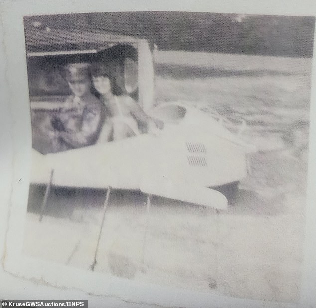 The black and white footage shows the then 24-year-old relaxing with Rosemarie Prass (pictured, right) while on leave from the army in the summer of 1959