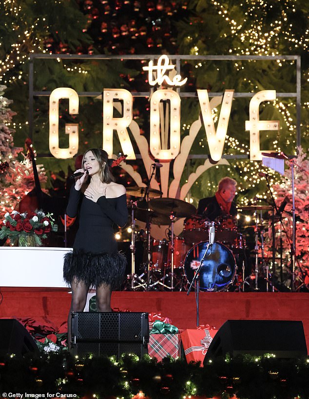 Sing it!  The duo had the audience in the palms of their hands as they took to the stage, decorated with lighted trees and poinsettias