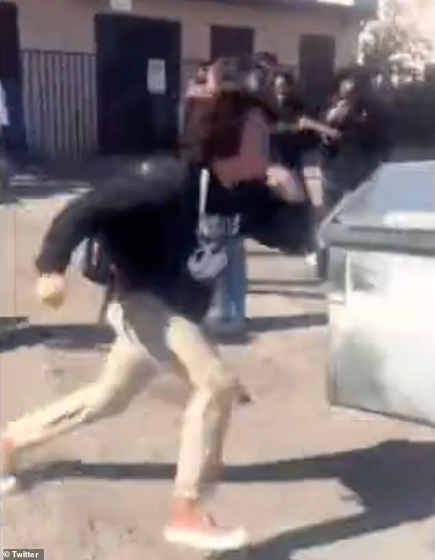 After Jonathan is knocked to the ground, one of his friends tries to intervene and stop the brutal attack before he flees