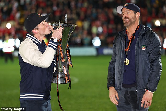 Incredibly, since the duo took over as co-chairmen, the club has gone from the fifth tier of the National League to League Two in the Football League (pictured with the Vanarama National League Trophy in April)