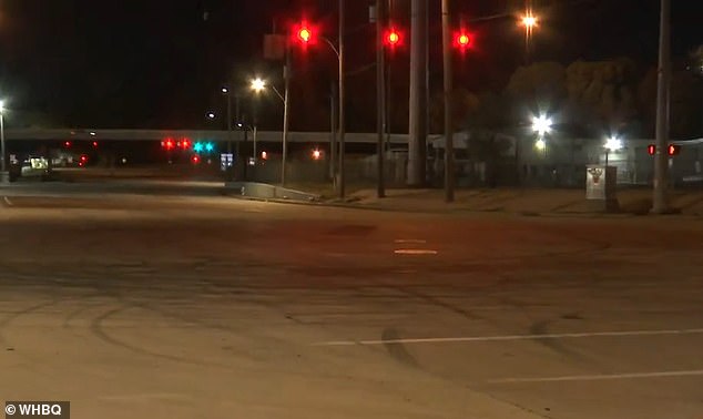 The road where the incident occurred had black tire tracks (pictured) covering the pavement