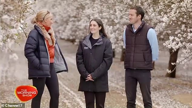 The 38-year-old is married to former fashion publicist Jenna Dinicola (centre) and together they run the Mandolé Orchard almond farm in Griffith.