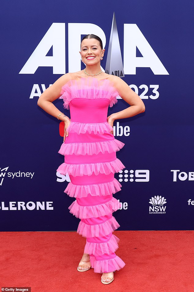 Triple J star Bridget Hustwaite made a style statement in a very unique pink dress with ruffled layers