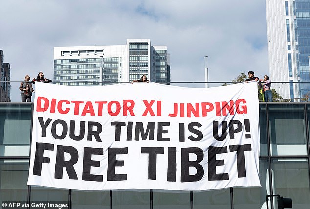 Some protesters branded Xi a dictator and demanded he liberate Tibet, adding: 