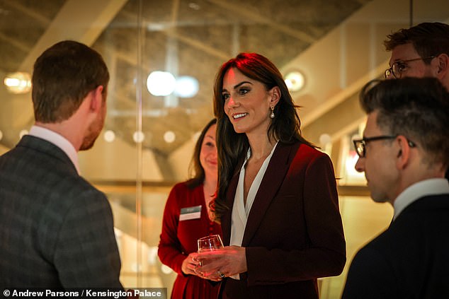 Kate appeared cheerful as she chatted with guests at the reception last night.  The event takes place today at the Design Museum