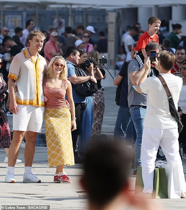 All smiles: the couple happily posed for photos, and Gary no doubt took some with him to show Dawn later