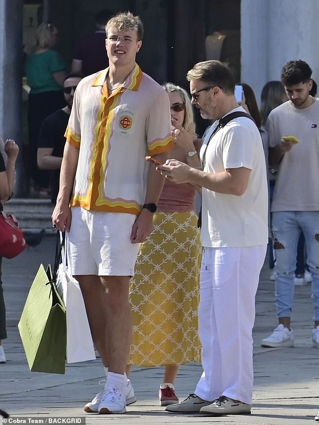 Nice!  Gary admires his work and three begin to plan their next move in the glorious Italian sunshine