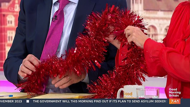 It's time!  The presenter, 52, was clearly very excited about the festive holiday as she couldn't resist dressing herself in tinsel