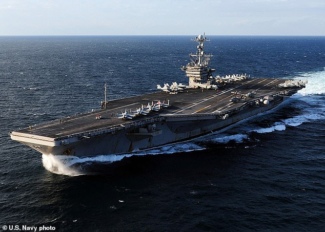 At least five crew members aboard the USS George Washington (pictured) were confirmed to have died by suicide.  There have been others who have attempted suicide but failed to commit suicide