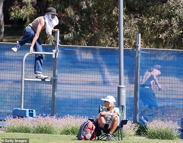 The shirtless pair took to the field of play during Adelaide's match against the Thunder