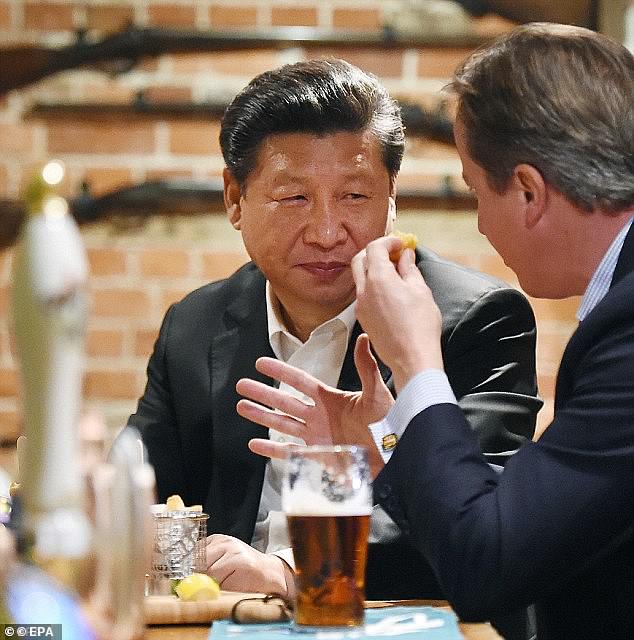 Xi Jinping stops for fish and chips with David Cameron at a Buckinghamshire pub in 2015