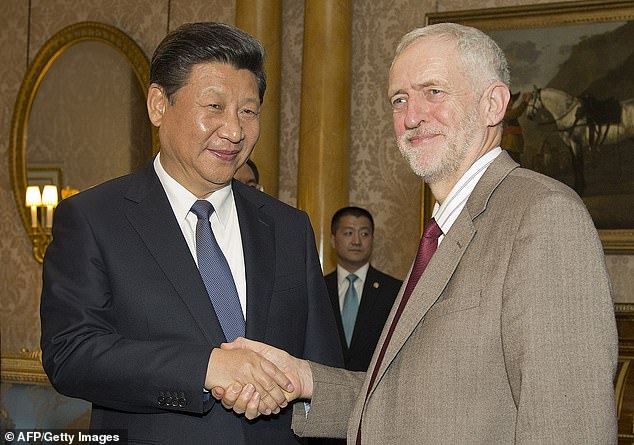 Next, Labor leader Jeremy Corbyn (R) meets Chinese President Xi Jinping at Buckingham Place in London on October 20, 2015, on the first official day of a state visit