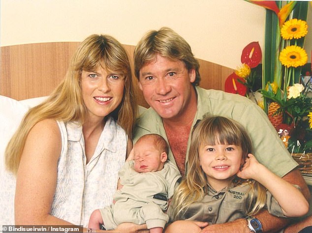 It was Steve's father, Bob, 83, who built the iconic Queensland zoo from the ground up in 1970 and passed it on to his late son and wife Terri in 1992.  (Image: Steve, Terri, baby Robert and Bindi in 2003)